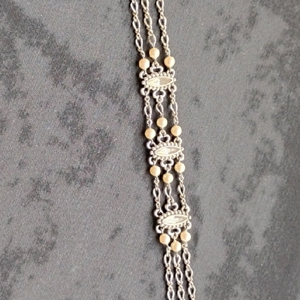 Elegant Silver and Gold Two-Tone Bracelet with Intricate Design